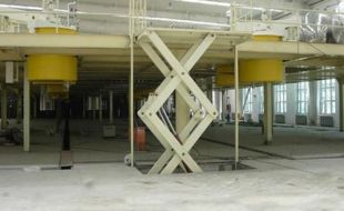 自動化流水線中剛性鏈升降平臺的智能解決方案